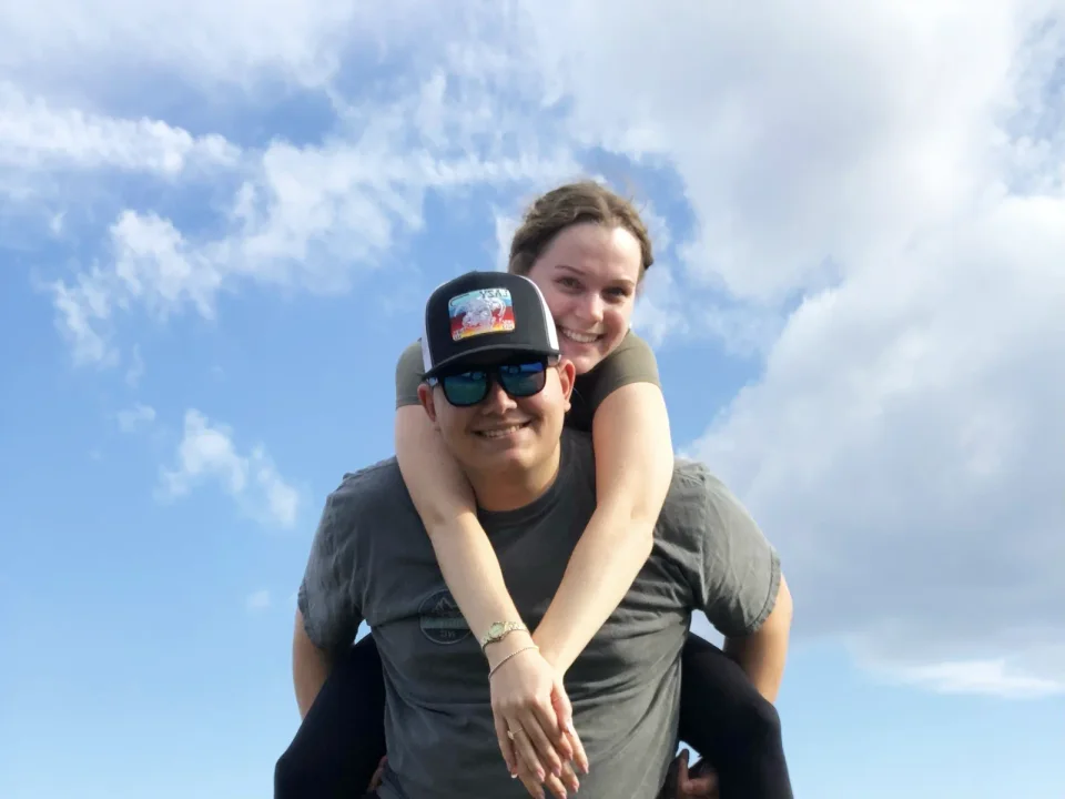 Two young adults enjoying time outdoors together